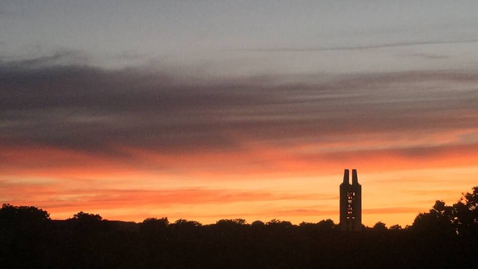 Dusk looking out over the valley below Mount Oread. Nothing beats wandering this scenic campus to the sound of the carillon bells which sound every quarter hour. On Wednesday evening and Sunday afternoons faculty or students perform on the instrument. Wander the green space around Potters Lake during a concert for a truly magical experience. The campanile is a WWII memorial, so be sure to check out the structure itself too.
