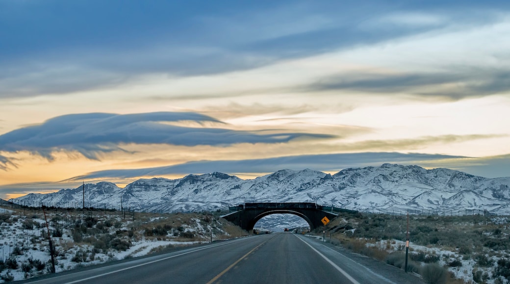 Sunset over the East Humboldt Range seen through a wildlife overpass bridge along Highway 93 looking South towards Wells, Elko County, NV, USA.