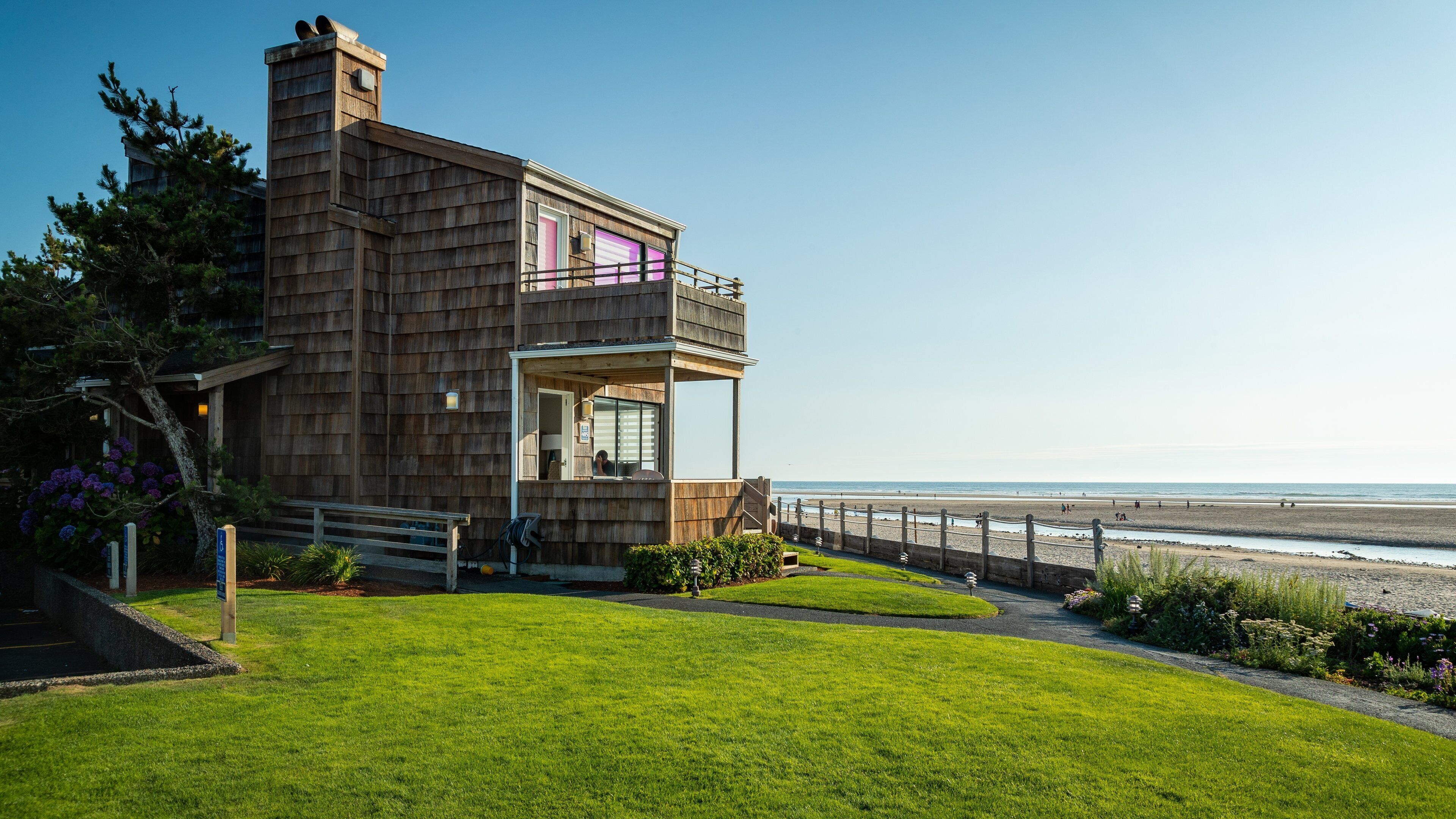 Cannon Beach showing a coastal town, a house and general coastal views