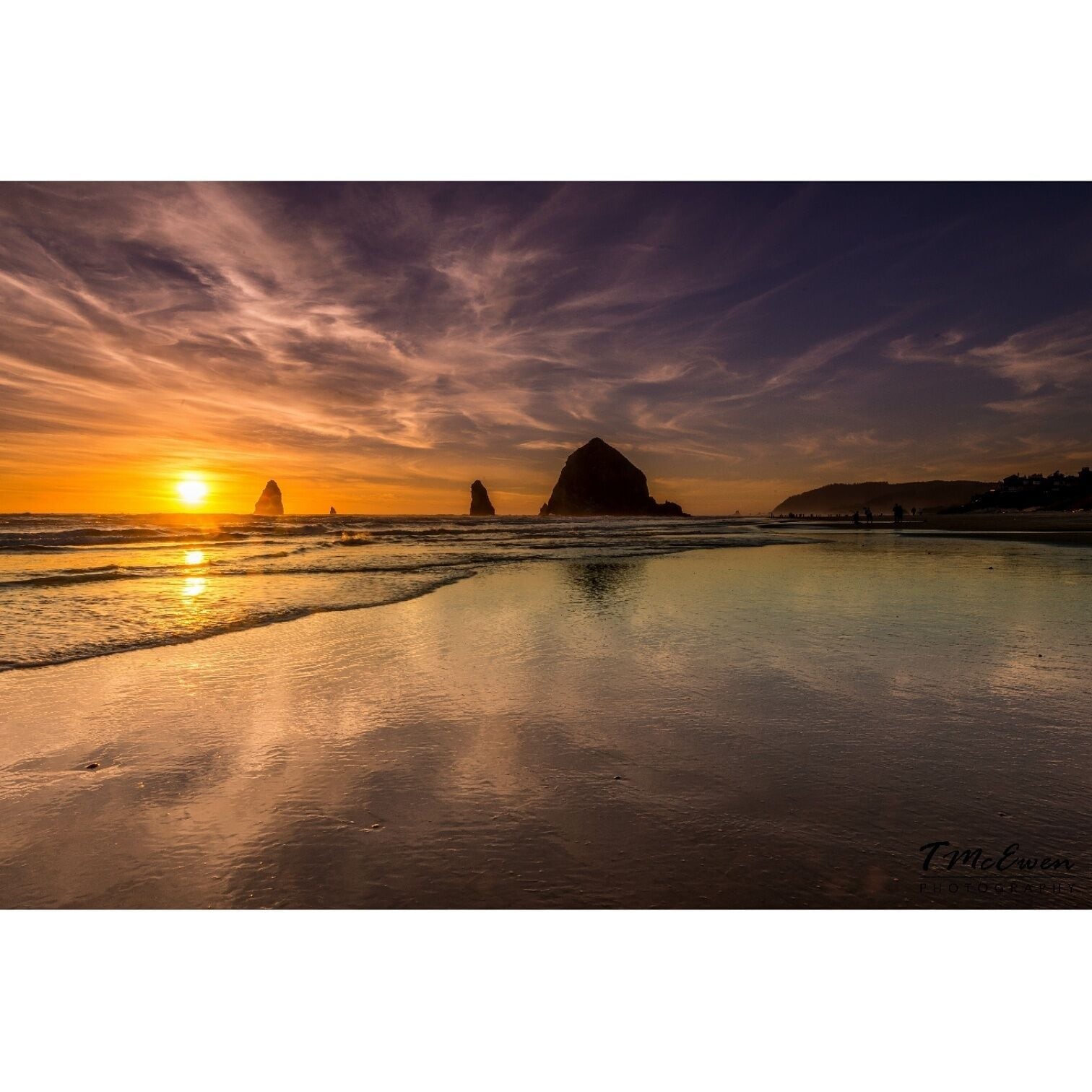 A sunset shot at Haystack Rock in Cannon Beach Oregon. One of the greatest places my wife and I have seen. You can see more of my work at www.tmcewenphotography.com 