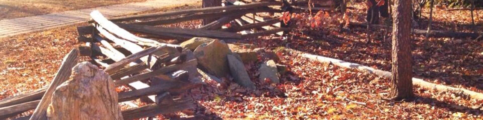 I discovered this little battlefield park while on a walk with my boyfriend. Having only lived in the area for two weeks, I didn't know this was down the street. The park itself is small, quaint even, but the informational plaques were helpful, if but a bit sad. There are photographs of what the area looked like (along with maps) when the battle took place. Now you look around and only see developments.
The pathway is decent and wheel chair accessible (if but a bit bumpy) and there's a small parking lot.