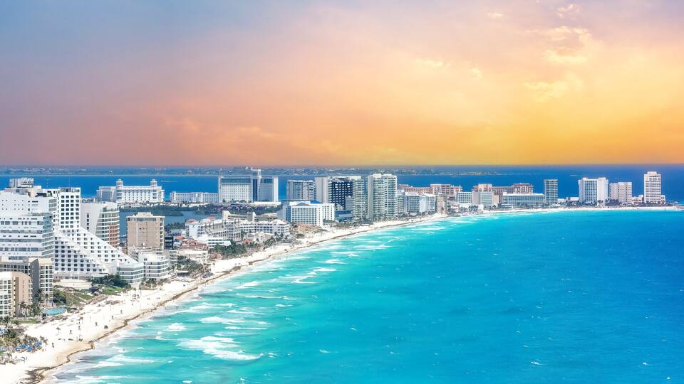 Cancun skyline with beach and blue water