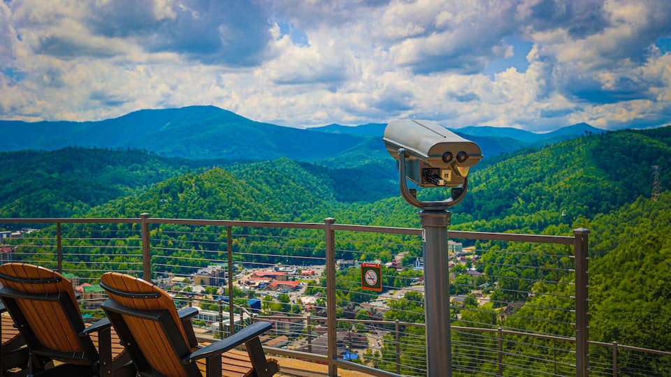 coin-operated viewing telescopes with a view of the Smokey Mountains in downtown Gatlinburg, Tennessee