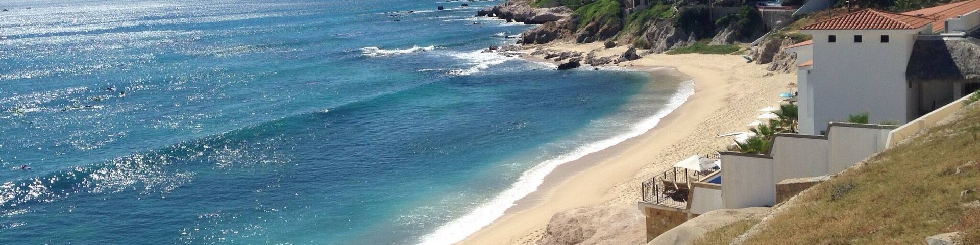 Cool overlook where surfers were having fun with waves on the way to the airport to drop off our friend Mark.
