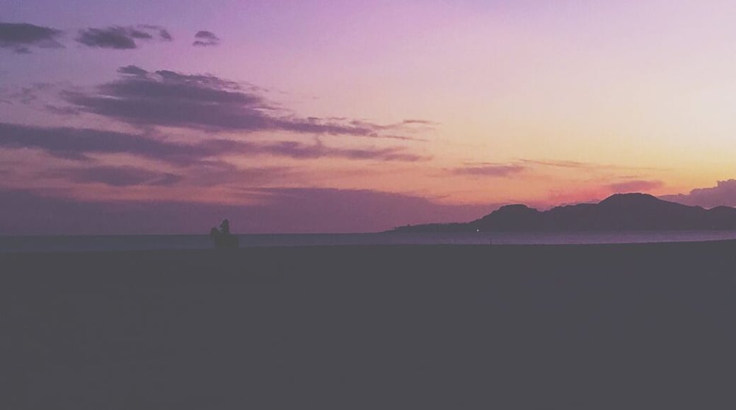 #Colorful sunsets are made even better as a lone Mexican cowboy rides his horse along the coastline. #goldenhour