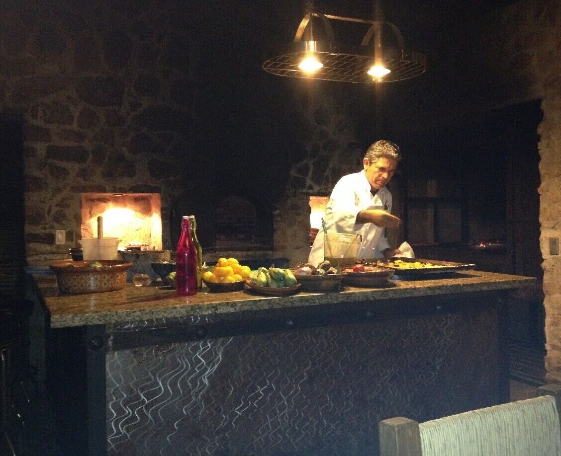 Every once in a while, I come across a place that is so special, that I struggle with whether or not to even Trove it and let my secret out.  El Tamarindo is such a place.  For those of you who know the area, this place is similar to Flora Farm, or at least as you might have imagined it in it's early days (more rustic/less refined, etc.).  It is remote and out of the way, seemingly in the middle of nowhere (end of a long and very dark dirt road!), but upon arrival, you are transported to a Tuscan like setting that is completely removed from anything you'd expect to find in Baja.  Much of the cooking is done in an outdoor kitchen (see photo), and the menu is farm fresh, to say the least. After a chat with the incredibly friendly, and hospitable owner/chef, Enrique (pictured), we settled on a family style menu where he just brought food until we raised the white flag; incredible.  Lobster, shrimp, rib-eye steak, roast chicken, pasta marinara (sauce was as good as I've had - took some home!)!), sun-dried chile rellenos (one of my favorites), and the most beautiful roast vegetables you'll ever see, of every imaginable color and type. The tomatoes (every color) were particularly impressive; group favorite  Without question, one of the coolest/most memorable dining experiences I've had in Mexico, or anywhere for that matter.  Can't wait to go back.