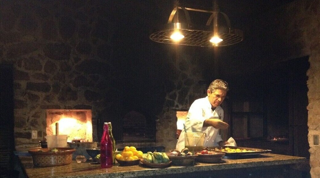 Every once in a while, I come across a place that is so special, that I struggle with whether or not to even Trove it and let my secret out. El Tamarindo is such a place. For those of you who know the area, this place is similar to Flora Farm, or at least as you might have imagined it in it's early days (more rustic/less refined, etc.). It is remote and out of the way, seemingly in the middle of nowhere (end of a long and very dark dirt road!), but upon arrival, you are transported to a Tuscan like setting that is completely removed from anything you'd expect to find in Baja. Much of the cooking is done in an outdoor kitchen (see photo), and the menu is farm fresh, to say the least. After a chat with the incredibly friendly, and hospitable owner/chef, Enrique (pictured), we settled on a family style menu where he just brought food until we raised the white flag; incredible. Lobster, shrimp, rib-eye steak, roast chicken, pasta marinara (sauce was as good as I've had - took some home!)!), sun-dried chile rellenos (one of my favorites), and the most beautiful roast vegetables you'll ever see, of every imaginable color and type. The tomatoes (every color) were particularly impressive; group favorite Without question, one of the coolest/most memorable dining experiences I've had in Mexico, or anywhere for that matter. Can't wait to go back.