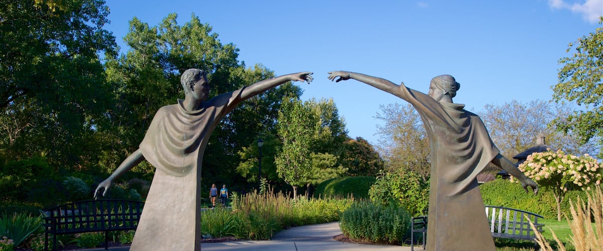 Mishawaka featuring a statue or sculpture, a park and outdoor art