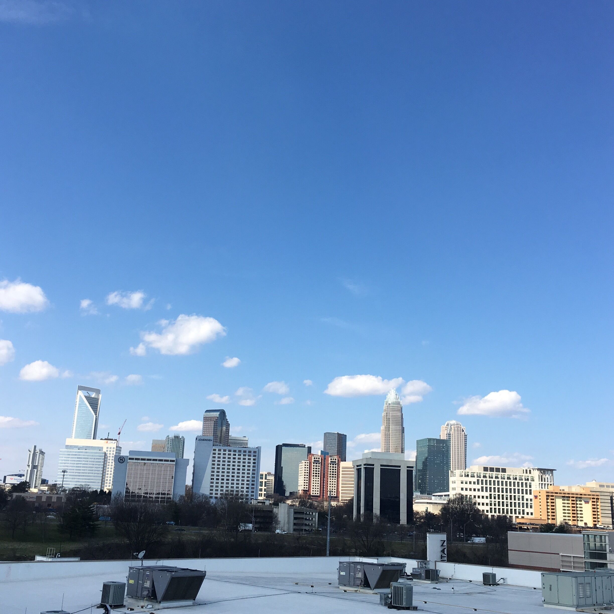 CLT. Carolina blue skies and a skyline to match. #blue #findarooftop