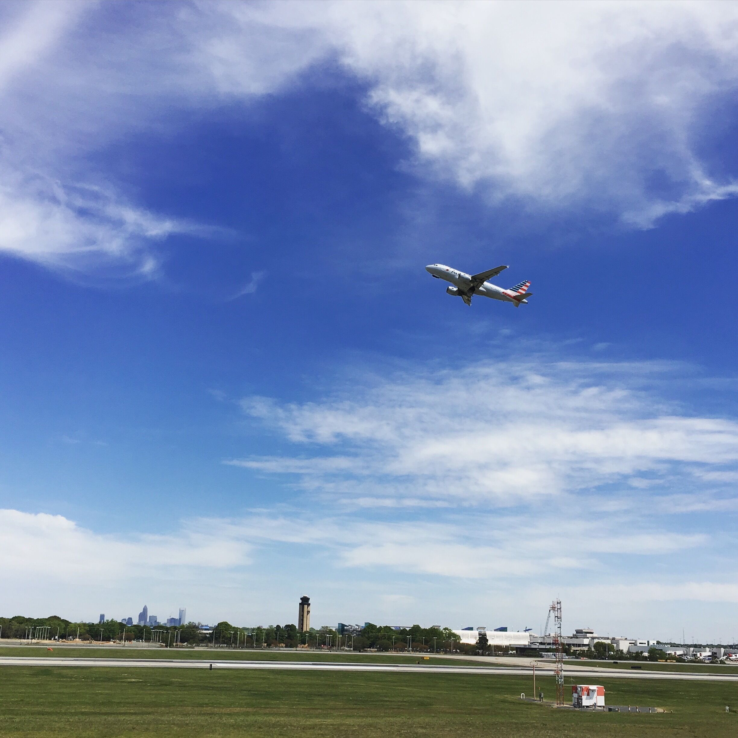 At the overlook. Second best thing to being on a plane is watching them take off into the wide open sky and dreaming of all the places they could be headed. #blue 