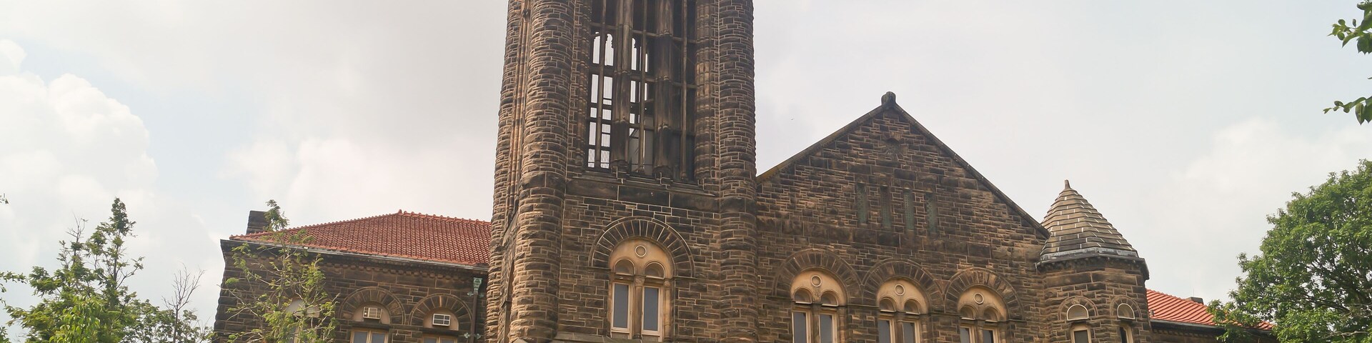 Champaign, Illinois / USA - June 13 2022: Beautiful Fountain with Plants and Flowers at University of Illinois Urbana-Champaign