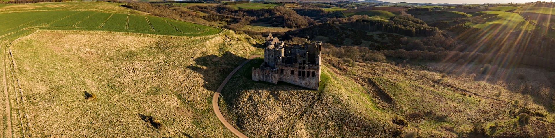 Aerial view of the ruins of Crichton Castle, near the village of Crichton, Midlothian, Scotland, UK