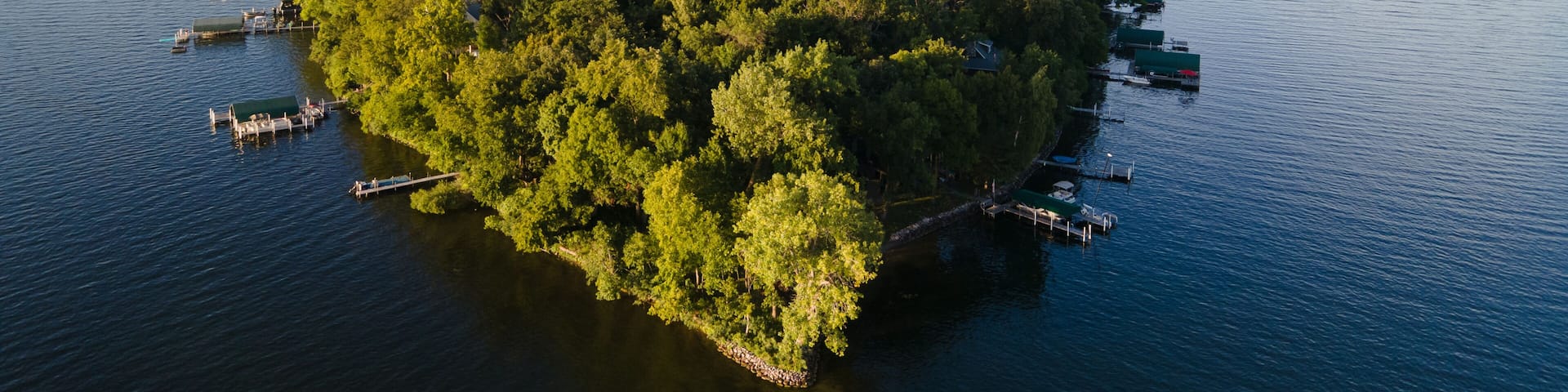 Forest-Covered Island in Lake Minnetonka: Aerial View on a Serene Summer Day