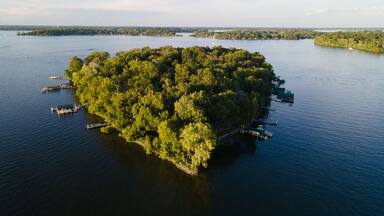 Forest-Covered Island in Lake Minnetonka: Aerial View on a Serene Summer Day