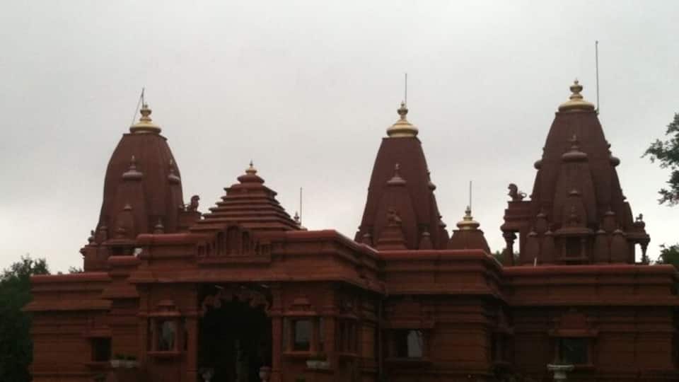 A large temple with multiple domes and a central entrance.