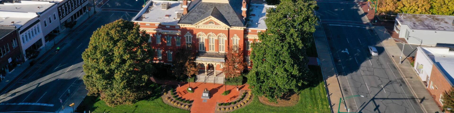 Aerial view of the old Court House in Monroe NC. Looking at the front of the build from the right side.