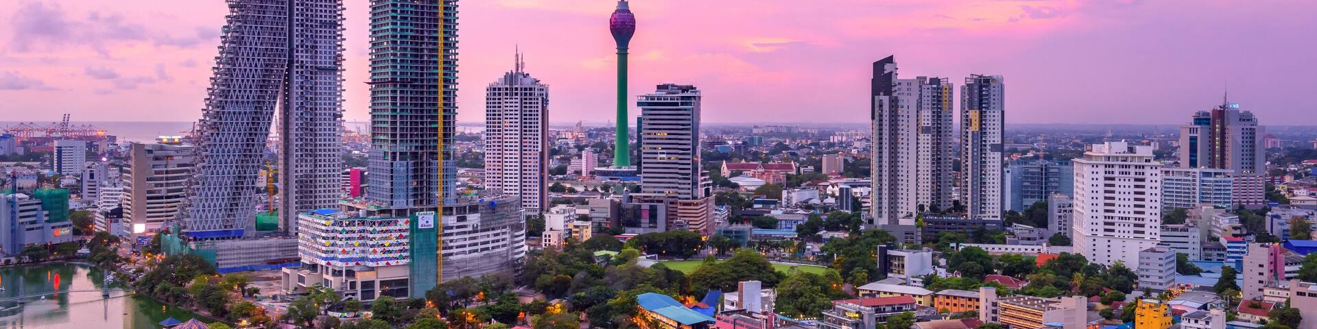 Colombo Sri Lanka skyline cityscape photo. Sunset in Colombo with views over the biggest city in Sri Lanka island. Urban views of buildings and the Laccadive Sea