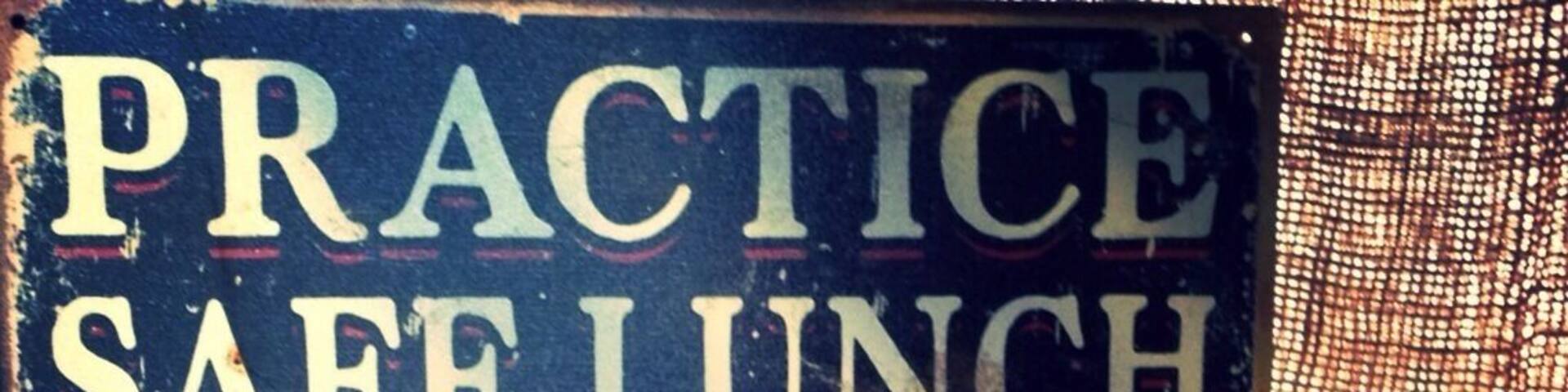 Practice safe lunch; use condiments!
BBQ joint next to a small airfield. Cool spot to hang out on the patio picnic benches when the weather is nice.