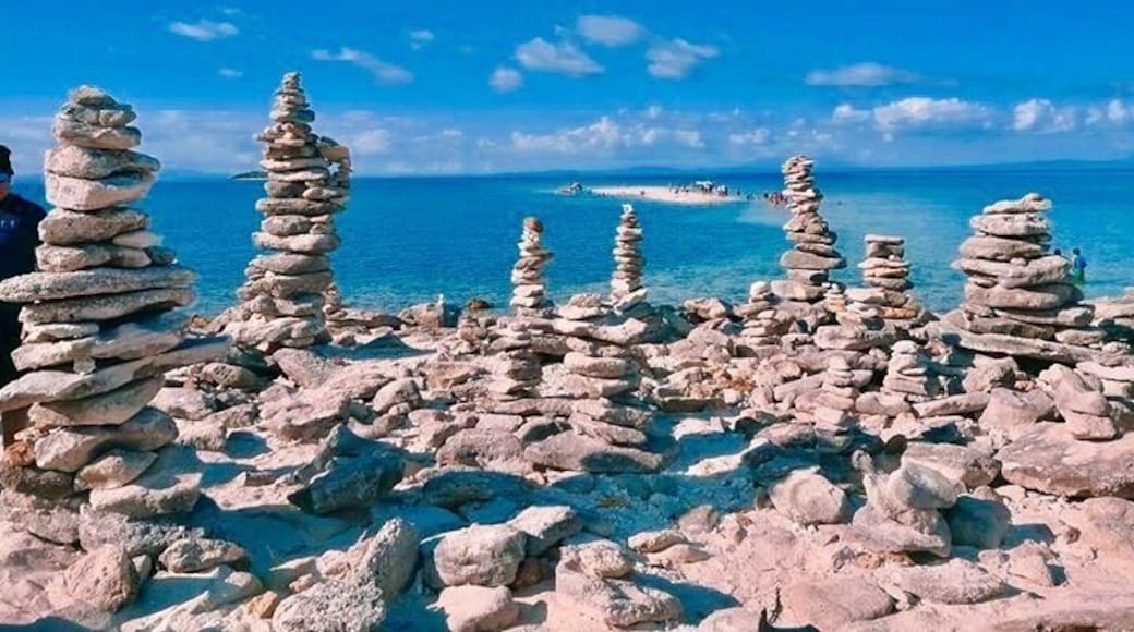 Tinalisayan Island is very calming - a row of palm trees, cool ocean breeze, rock formation, fine white beach and crystal clear waters! The surroundings is so relaxing the air, the trees the entire island is very peaceful ideal for nature lover or loves the beach and island hopping. Plus this destination is isolated therefore you wont worry a crowd or noise. Its also clean and untouched. Even though there are no water supply, the island beauty is enough.
#beachtips
#BVSBlue
#islandgirl