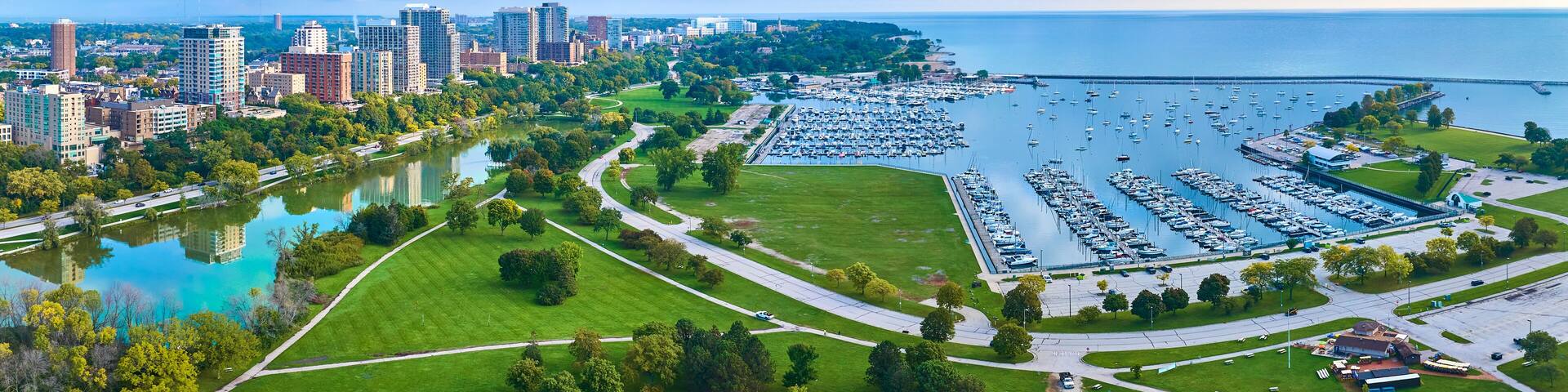 Aerial Milwaukee Marina at Dawn with Urban Skyline and Park Panorama