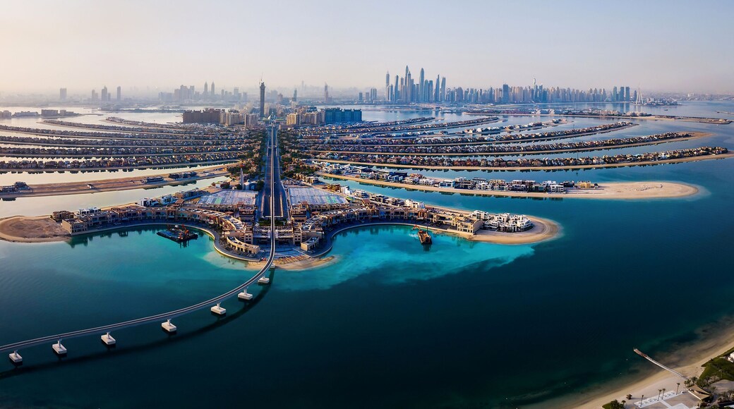 The Palm island panorama with Dubai marina in the background aerial