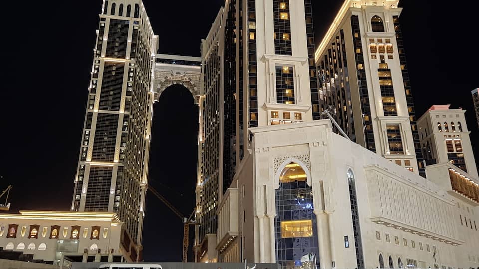 Beautiful night time view of Jabal Omar residential complex in front of Masjid al-Haram, Mecca, Saudi Arabia.