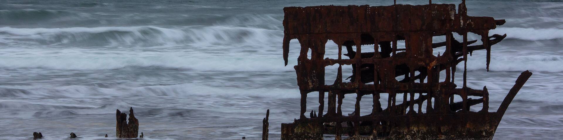 Peter Iredale Shipwreck at Dusk on Pacific Ocean Beach in Fort Stevens State Park Near Astoria, Oregon