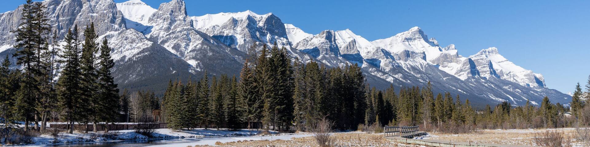 Policeman Creek Riverside Trail, Spring Creek Boardwalk in winter season. Town of Canmore, Alberta, Canada.