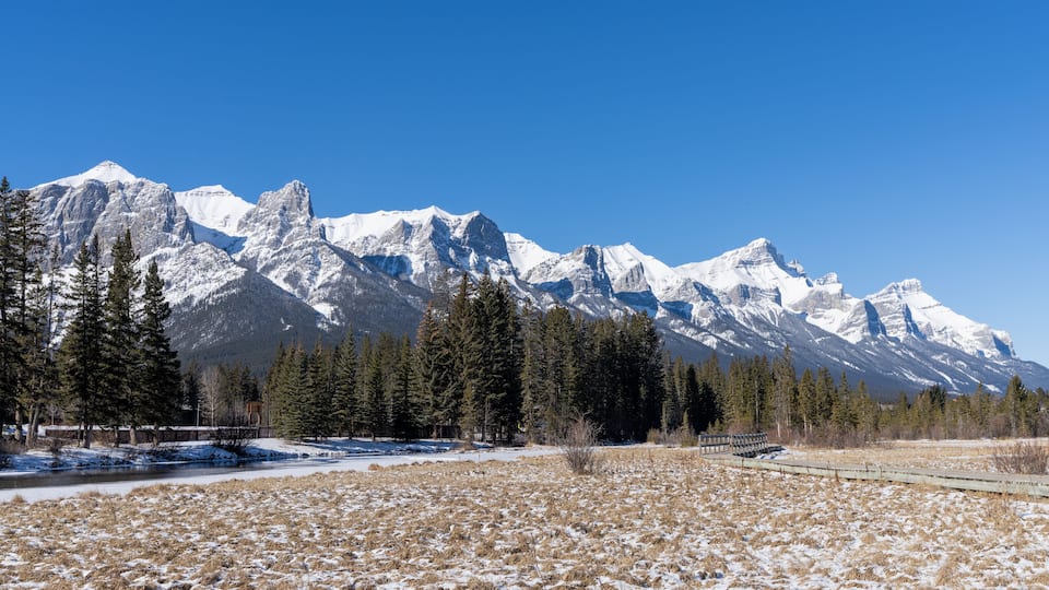 Policeman Creek Riverside Trail, Spring Creek Boardwalk in winter season. Town of Canmore, Alberta, Canada.