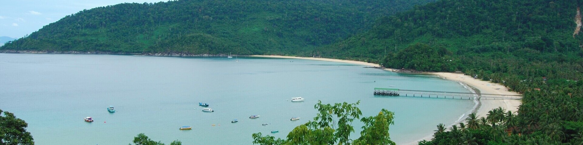 This is almost the entire bay of Juara on Tioman Island. I love that the village is tradition with no large hotels or obnoxious buildings to ruin the amazing natural scenery. The beach is great with little to no waves during the dry season making it great for swimming, snorkeling, diving, kayaking, and paddle boarding! The area around the island is a national marine park so hopefully that will keep the development down and continue to encourage eco-toursim! This was our favorite place we went in Malaysia!!
