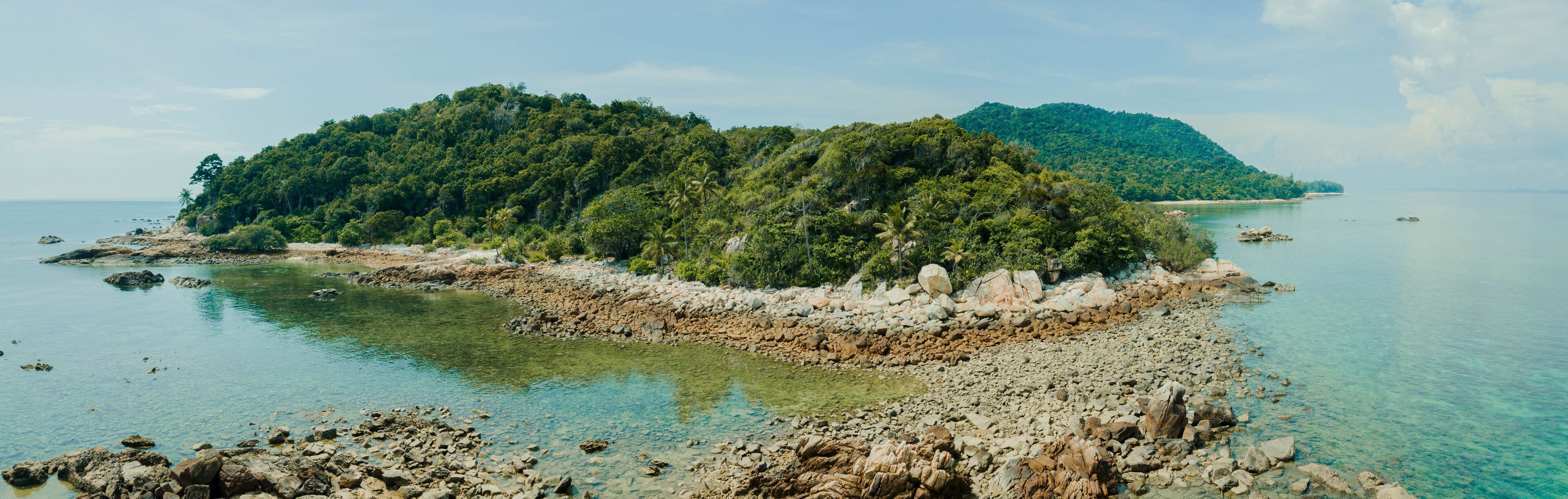 Aerial drone view of coastal scenery at Besar Island or Pulau Besar in Mersing, Johor, Malaysia