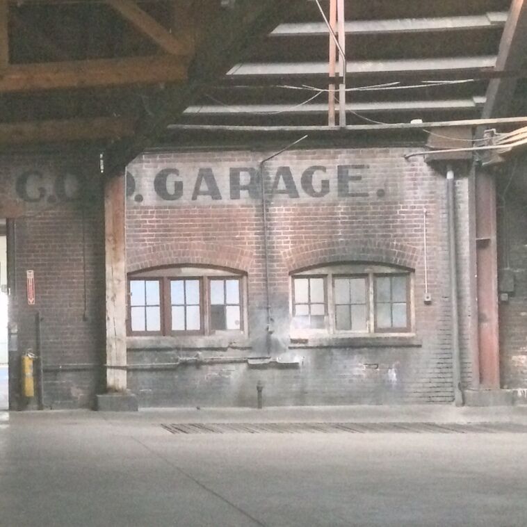 The interior of the C. O. D. Garage showing the original exterior. 