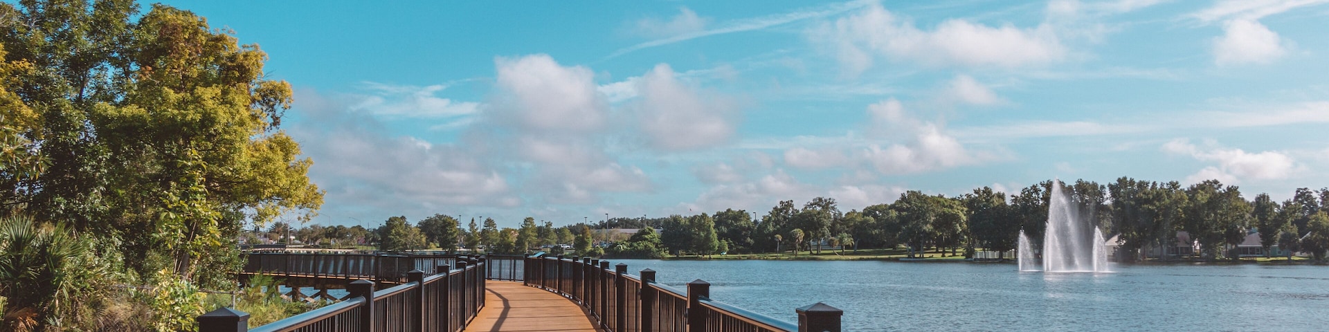 Casselberry, a suburb of greater Orlando, Florida: Boardwalk with fountain in Lake Concord