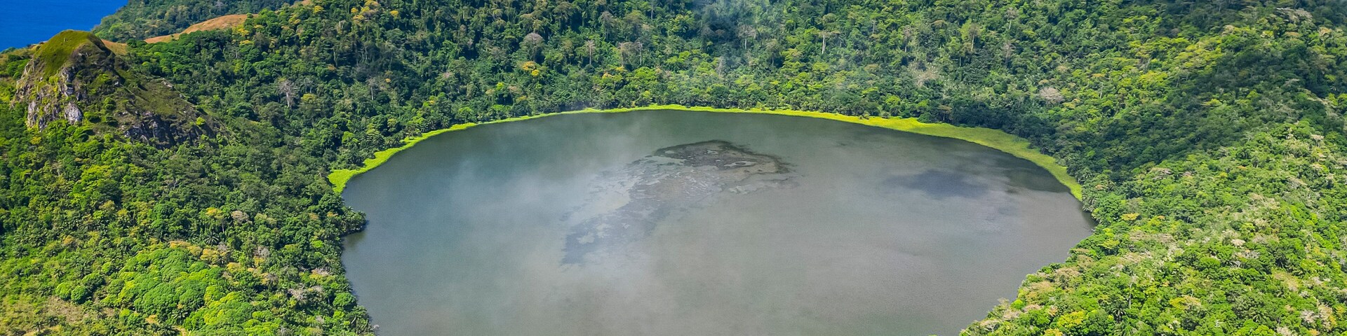 Aerial of the volcanic crater with Lake Mazafim, island of Annobon, Equatorial Guinea, Africa
