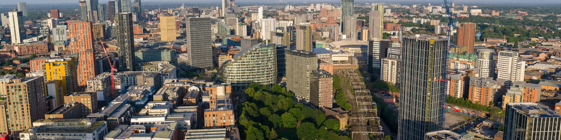Aerial image of Manchester skyline in the morning showing Northern Quarter area and Victoria Riverside.