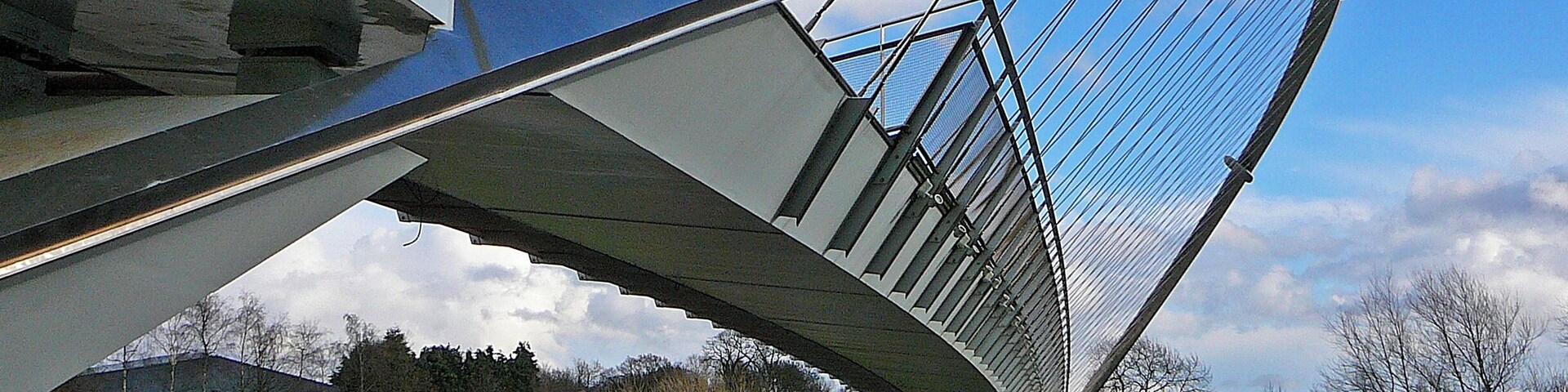 The Millennium Bridge spans the River Ouse to the south of York, linking Hospital Fields Road and Maple Grove in Fulford with Butcher Terrace on the South Bank