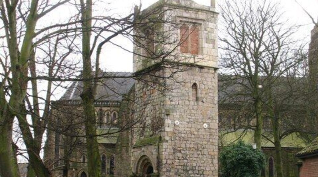 St Lawrence old tower The medieval church of St Lawrence has entirely gone except for its tower which has a Norman doorway, 13th century windows above and a 15th century top. The little tower is dwarfed by the huge Victorian church behind.