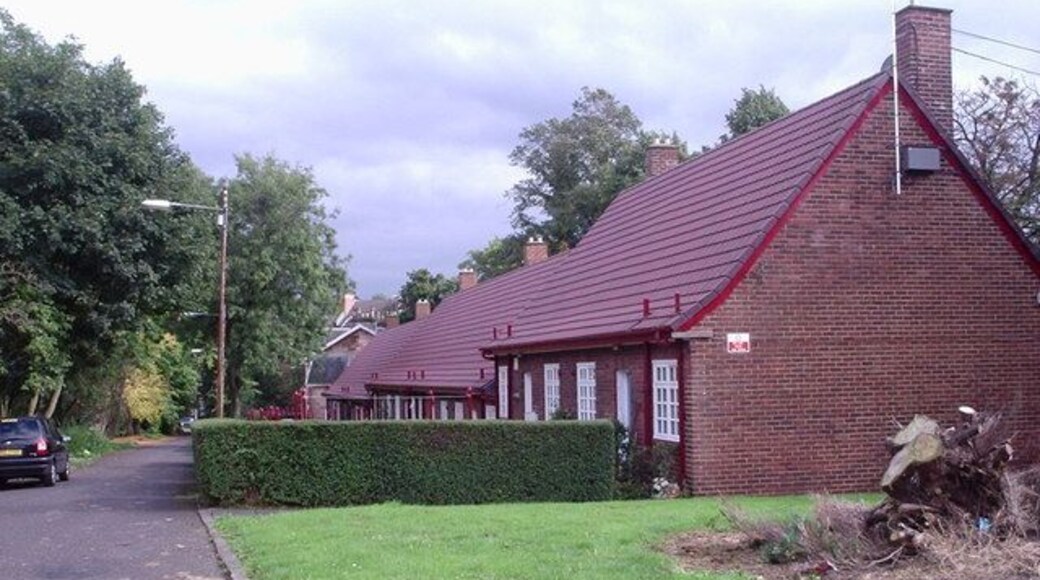 Crosshill Avenue On the original site of Crosshill House with links back to Medieval times this sheltered housing project in Crosshill Avenue is a simple design of a Town-scape (red brick, small-paned casements, red tile roofs etc.) They became category B listed buildings in 1949 forty years after construction. It received a Festival of Britain Award of Merit in 1951.