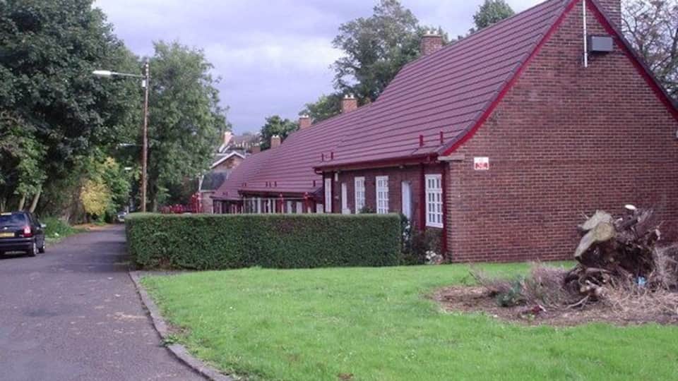 Crosshill Avenue On the original site of Crosshill House with links back to Medieval times this sheltered housing project in Crosshill Avenue is a simple design of a Town-scape (red brick, small-paned casements, red tile roofs etc.) They became category B listed buildings in 1949 forty years after construction. It received a Festival of Britain Award of Merit in 1951.