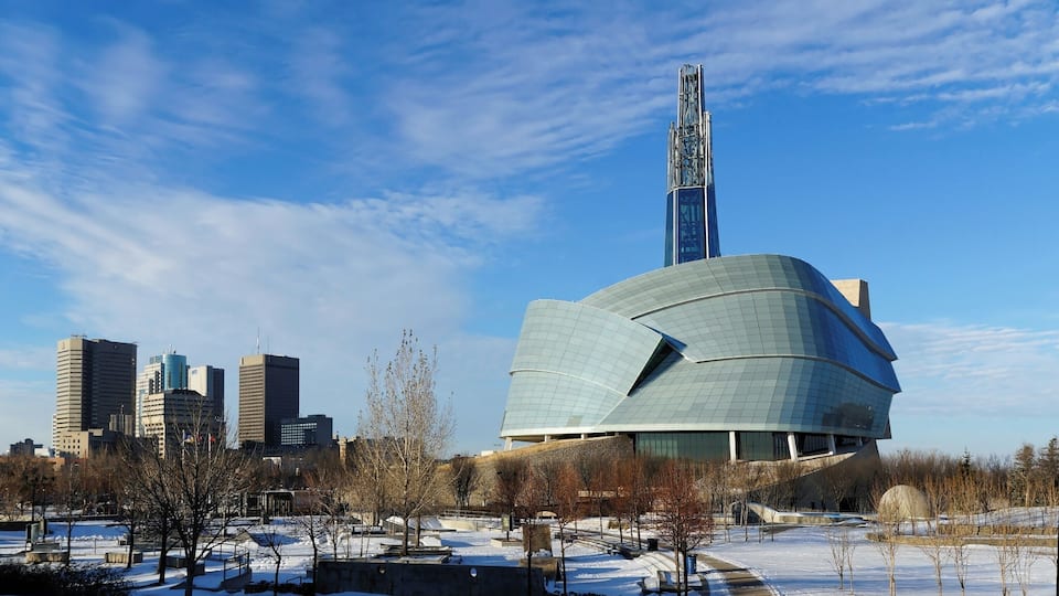 Winnipeg downtown cityscape. Winter view on Canadian Museum for Human Rights seen from The Forks park. Winnipeg, Manitoba, Canada