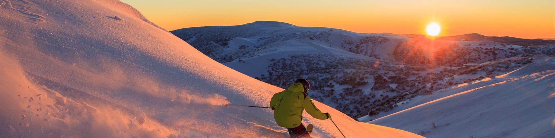 Hotham Heights which includes snow skiing, a sunset and snow
