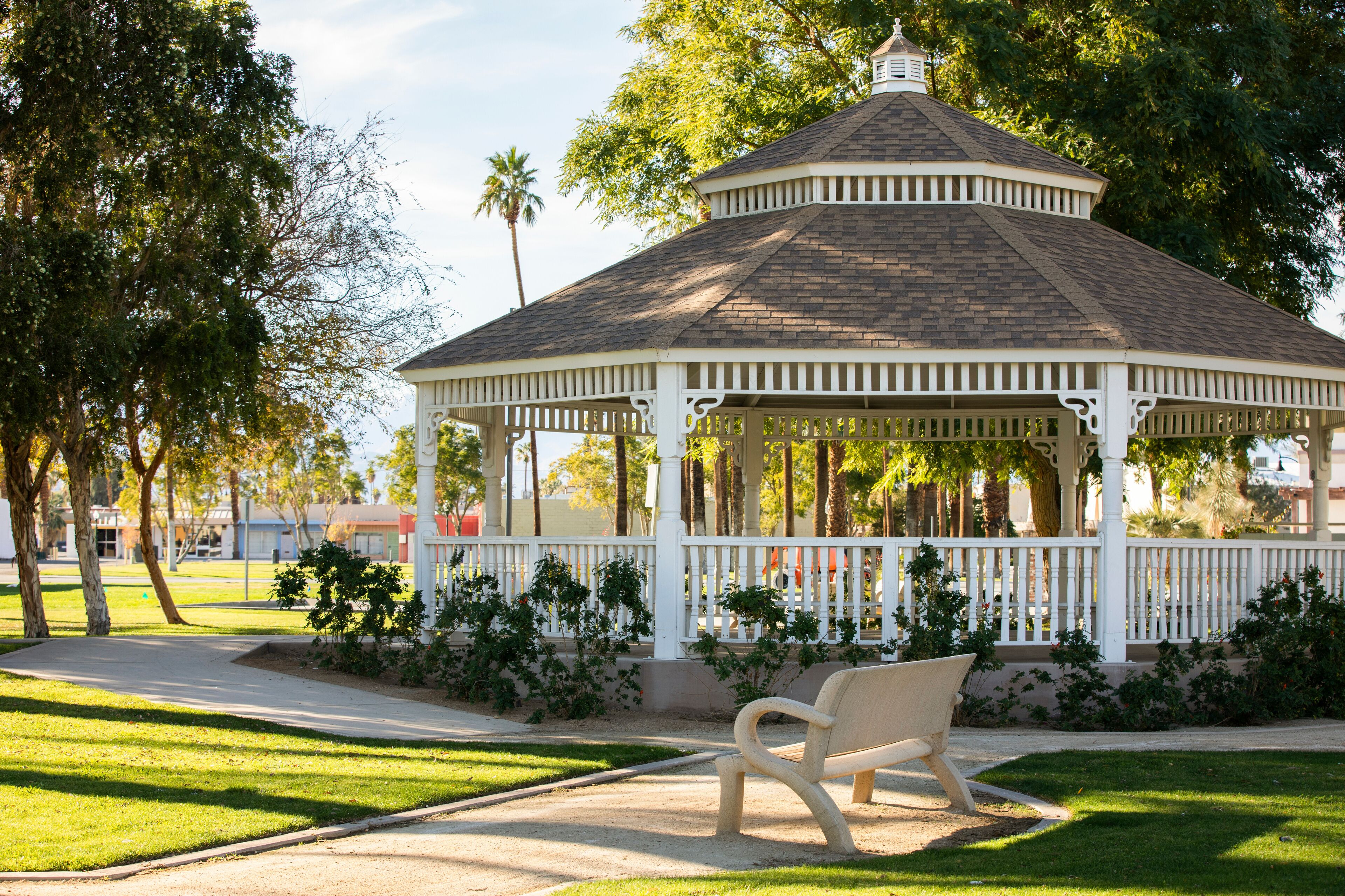 Late afternoon view of a public park in downtown Indio, California, USA.