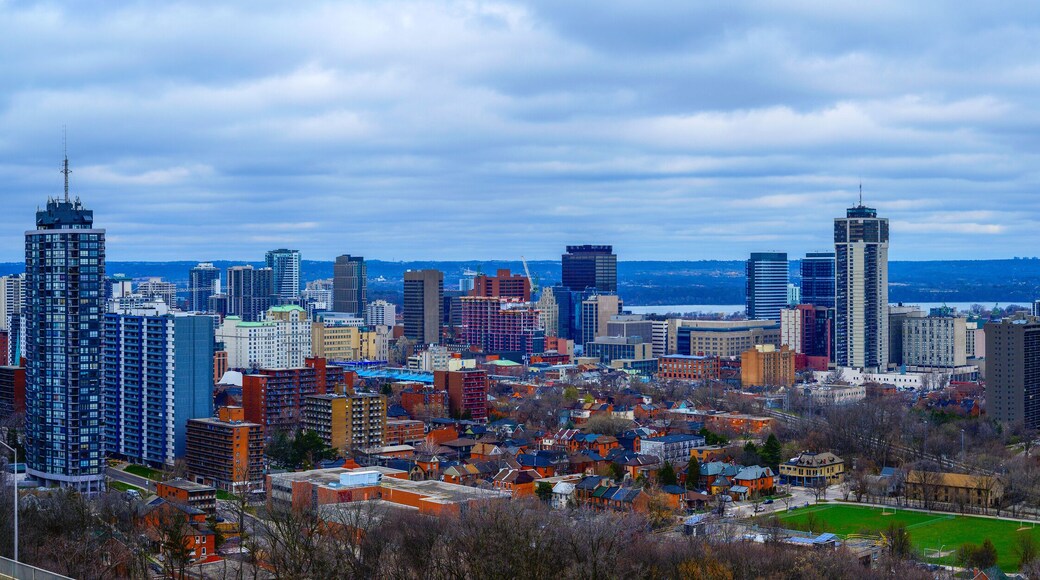Hamilton Ontario city skyline, downtown buildings, horizon, and the Lake Ontario in the distance in Canada, view from the Niagara Escarpment in Sam Lawrence Park