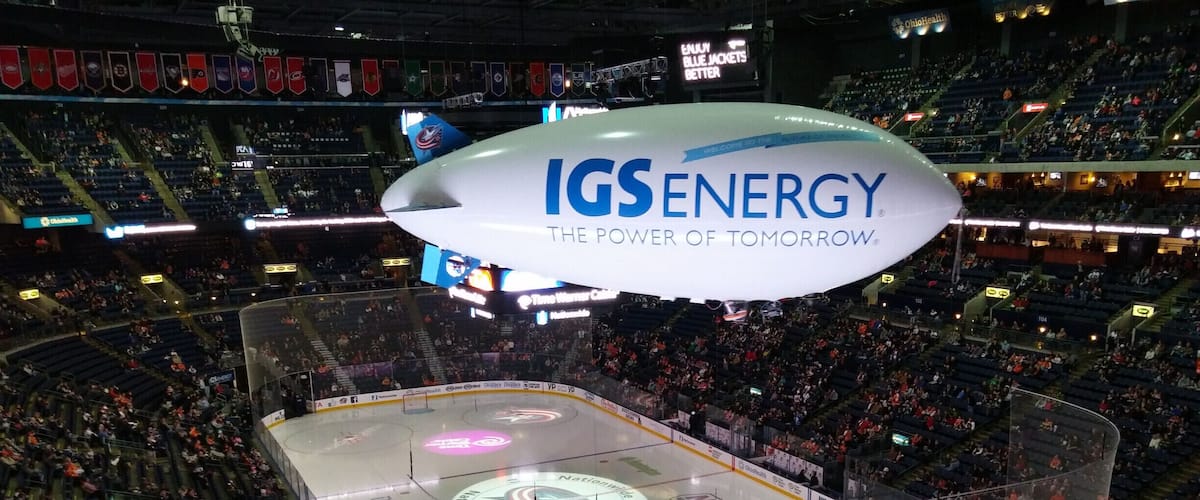 The IGS Energy blimp is a remote control blimp that flies around inside Nationwide Arena during intermissions of Columbus Blue Jackets hockey games. The blimp has a camera that films and projects fans on the giant Dispatch media center that hangs in the center of the arena. The blimp also drops prizes/coupons to eager fans via mini-parachutes.