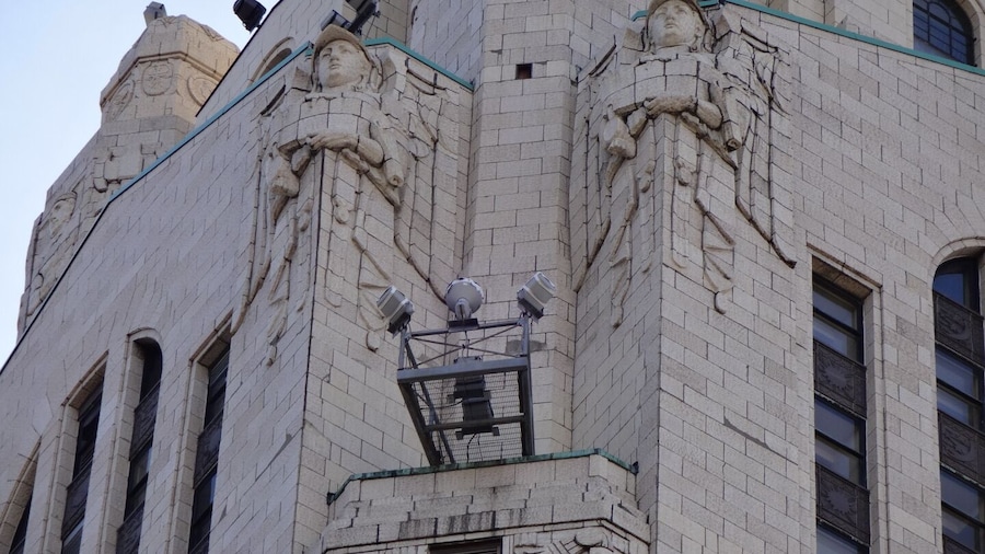 The LeVeque Tower is a steel frame building covered in glazed architectural terra-cotta tiles with an oak-bark texture.
Originally, the building's exterior featured a large number of sculptures. However, much of it had to be removed because the terra-cotta began to crumble and fall to the street. Lost sculptures include four 18 feet eagles at the corners of the building at the 36th floor and four 20 feet statues of colossus and youth on the sides of the building at the setback of the 40th floor
The spaces left by the departed sculpture serve as the bases for lights used to illuminate the tower. The Tower is often illuminated in white, but the colors change for certain holidays. Green for St,. Patrick's Day. Red, White and Blue for the 4th of July. Red and Green for the Christmas season.
#architecture