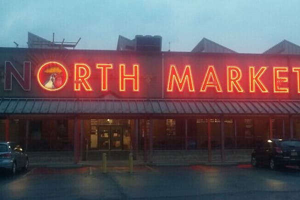 With history dating back to 1876, The North Market opened in its current location, the former Advanced Thresher warehouse, in 1995. The market houses over 30 merchants selling vegetables, seafood, meats, cheeses, candy, booze, flowers, baked good, etc. The market also offers many dine-in options as well, including Jeni's Splendid ice creams, pretzels from Brezel, deli sandwiches from Katzinger's, waffles from Taste of Belgium, and macarons from Pistacia Vera .