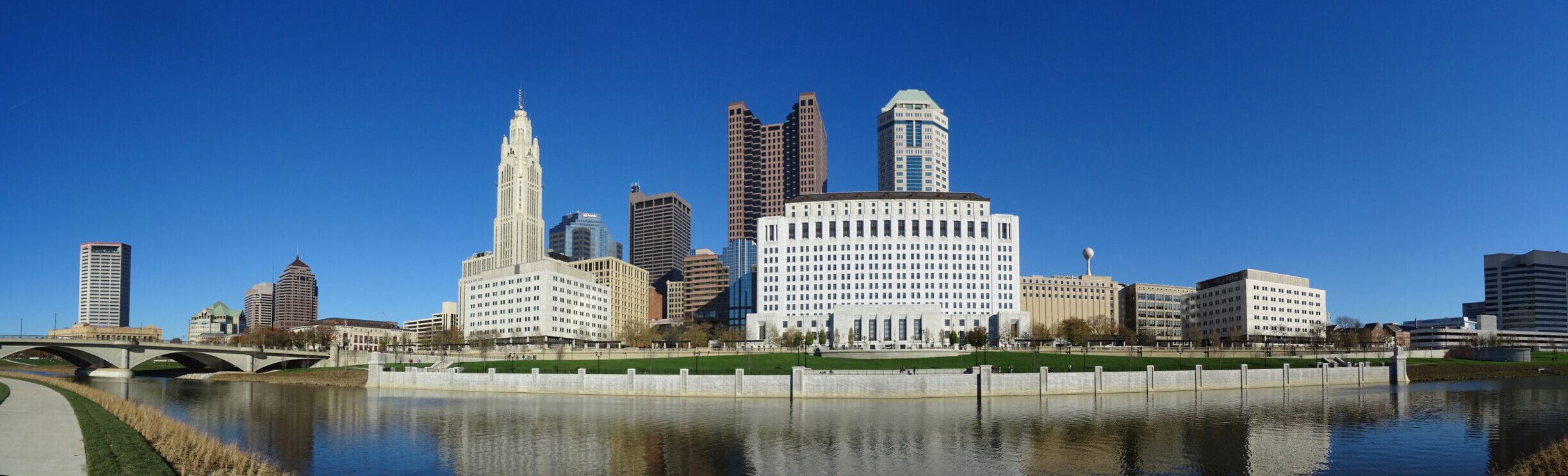 The downtown skyline as seen from in front of the Center of Science and Industry.

The Scioto Greenways project consisted of three primary components: 

1) removing the Main Street Dam, 
2) restoring the Scioto River channel, 
3) creating 33 acres of new green space.

