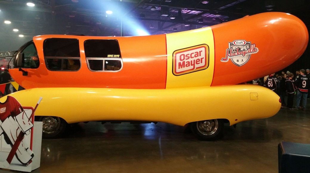 Behold, the Oscar Mayer Wienermobile in all its wiener-wonderment!
There are currently eight Wienermobiles gallivanting across county commandeered by Hotdoggers passing out Wienerwhistles to wiener fanatics.
The Wienermobile made a stop at the NHL All Star Fan Festival in Columbus. What's the connection between hockey and wieners? Well, Oscar Mayer is owned by Kraft and Kraft has a promotion called Hockeyville in which communities compete to demonstrate their commitment to the sport of ice hockey. The winning community gets a cash prize dedicated to upgrading their local home arena, as well as host an NHL preseason game.