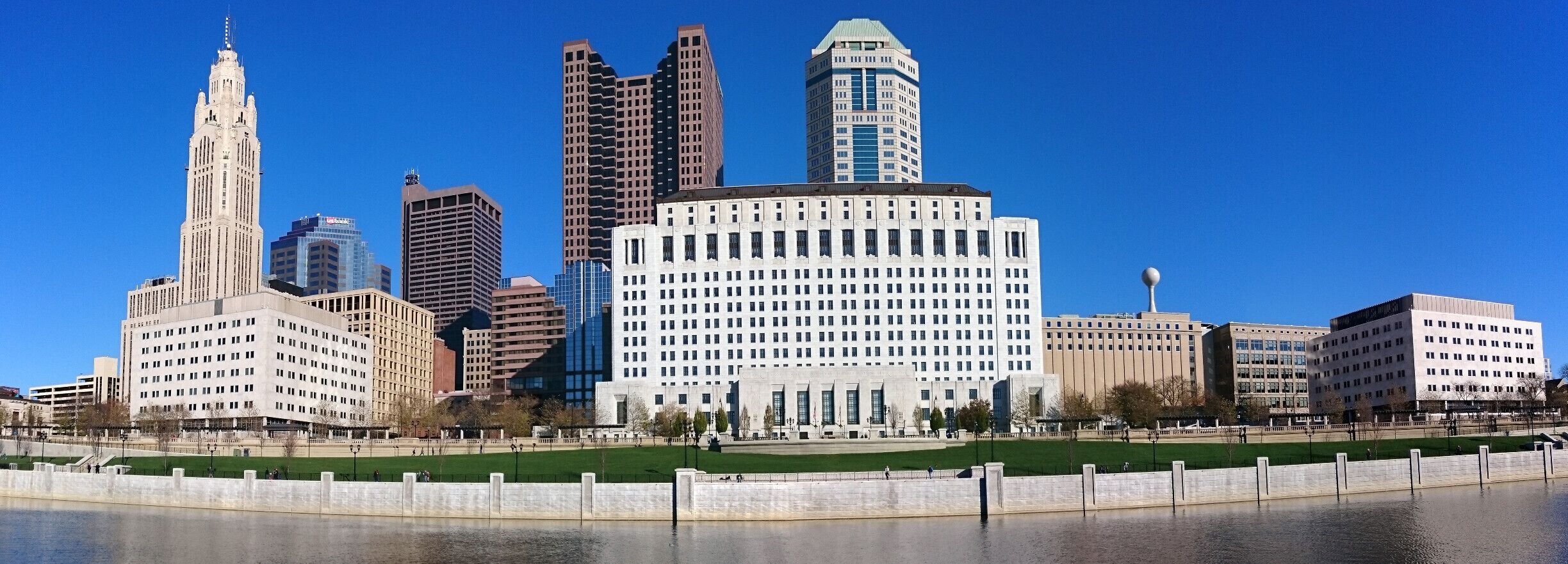 A view looking from the west side of the Scioto River over to the Supreme Court building and the newly laid sod on the Scioto Mile.

The Scioto Greenways project consisted of three primary components: 

1) removing the Main Street Dam, 
2) restoring the Scioto River channel, 
3) creating 33 acres of new green space.