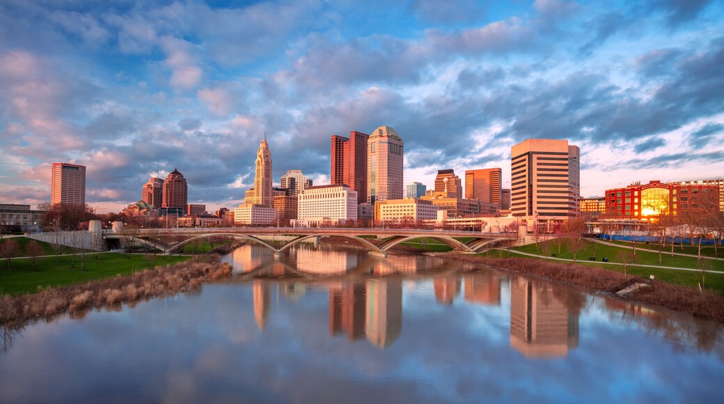 Columbus, Ohio, USA. Cityscape image of Columbus, Ohio, USA downtown skyline with the reflection of the city in the Scioto River at spring sunset.